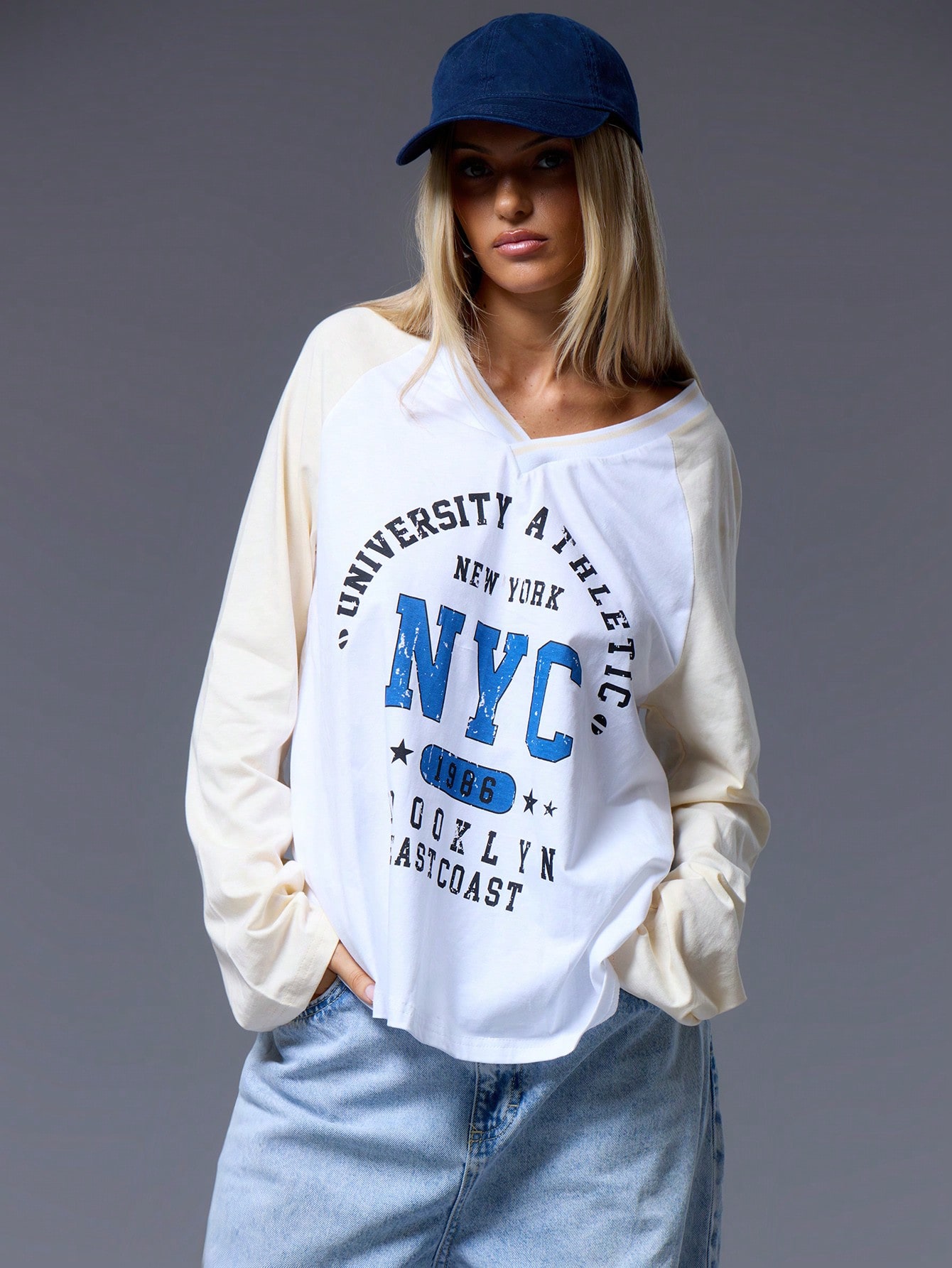 MUSERA V Neck Varsity Long Sleeve Top - Image 1