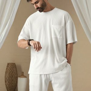 Manfinity KASUA Men Summer Solid Color Round Neck Oversized Short Sleeve Pocket T-Shirt And Shorts Set